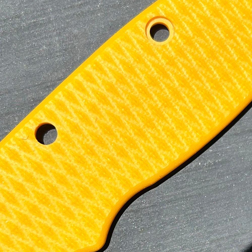 Close-up of yellow2 milled texture G10 replacement scales for AD20 folding knife.