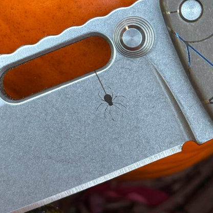 MGAD20 MagnaCut Clip Point Titanium Halloween 2025