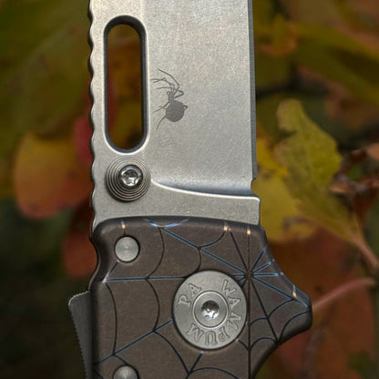 MGAD20 MagnaCut Clip Point Titanium Halloween 2025