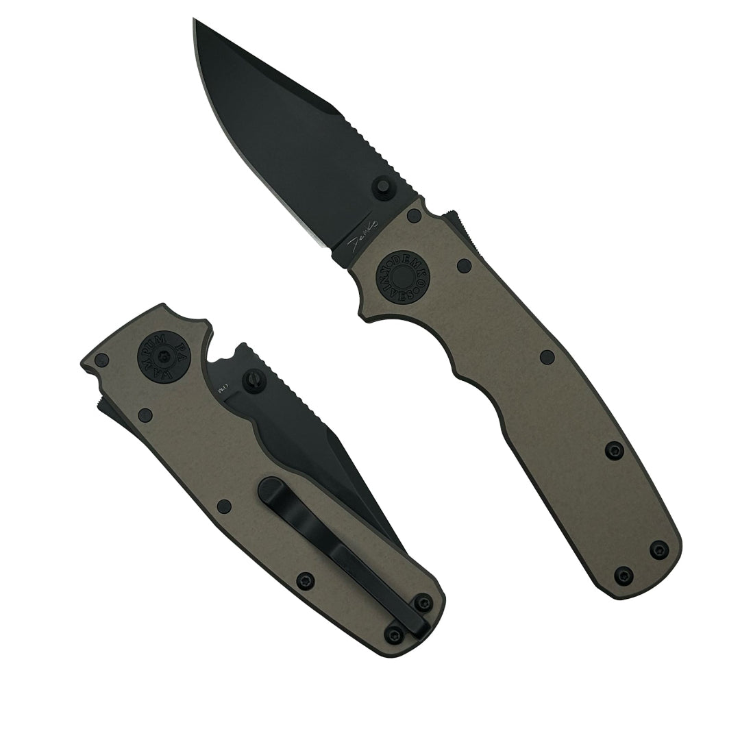 Shark-Cub Stealth Artillery Grey Anodized Aluminum folding knife with a CPM20CV DLC clip point blade.