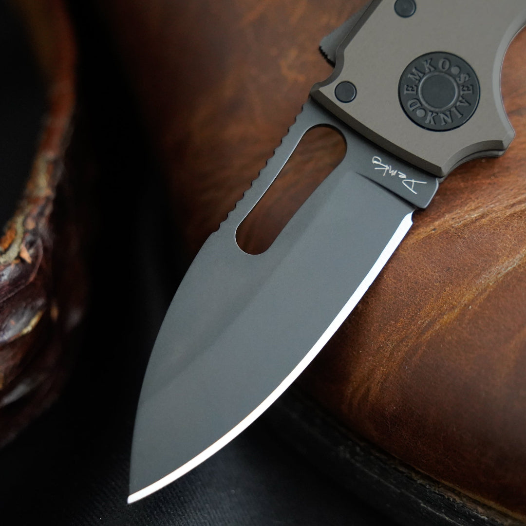 Shark-Cub Stealth Artillery Grey on a boot with alligator belt.