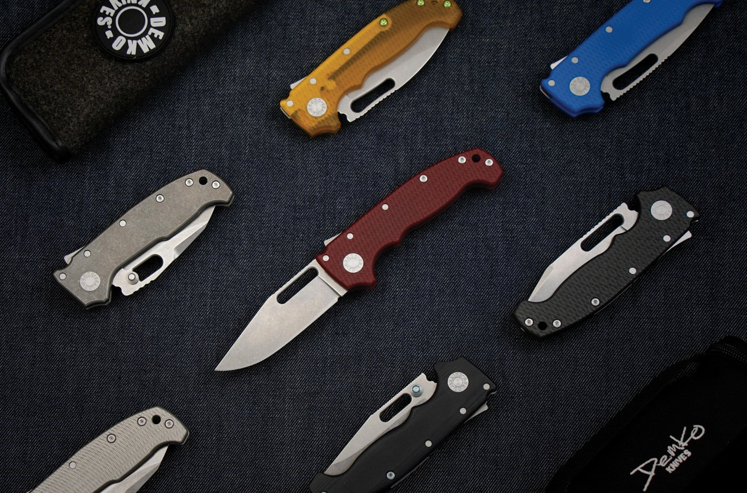 Photo featuring American Made AD20 models, and zipper cases, on a denim background.