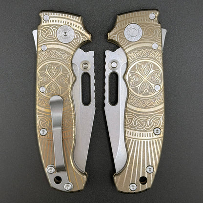 American made AD20S (Slim) closed folding knife with a laser etched titanium handle and a MagnaCut clip point blade.