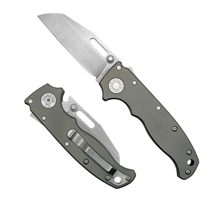 AD20.5 folding knife with a smooth titanium handle and a CPM20CV steel shark foot blade.