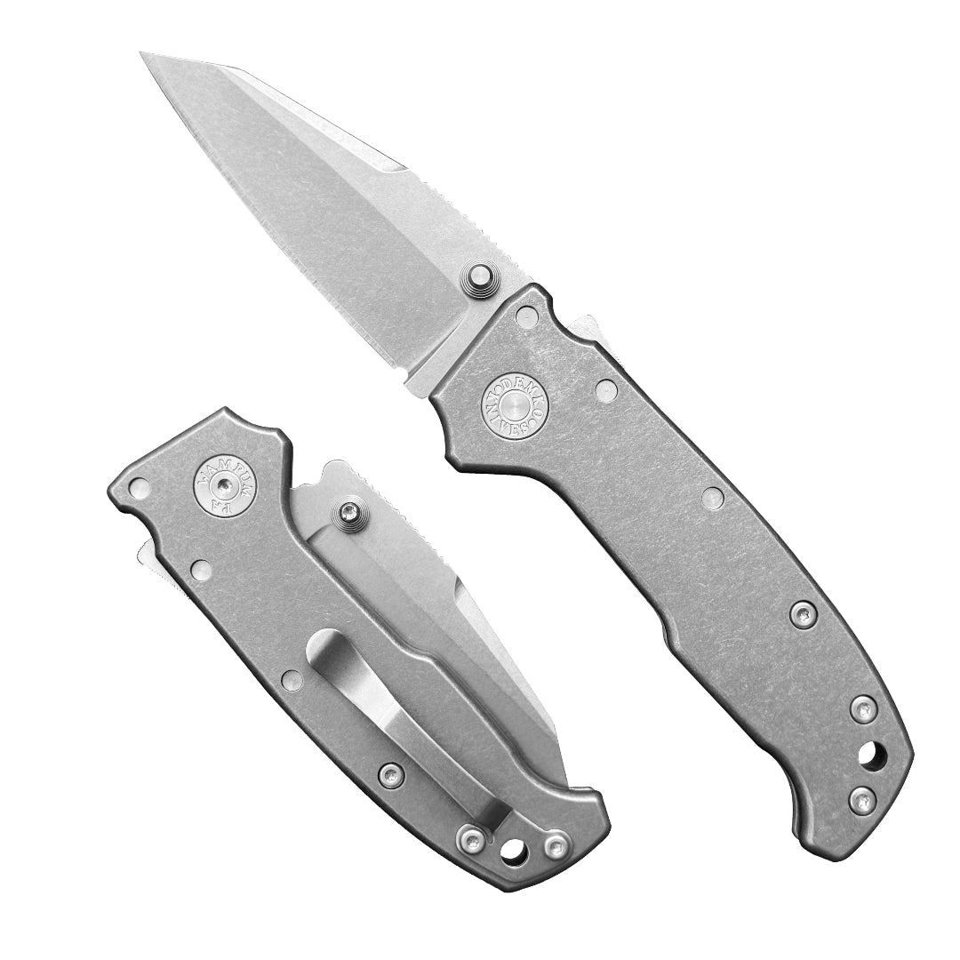 AD20S Compact Seax blade folding knife with a no slot blade and smooth titanium handle on a white background.