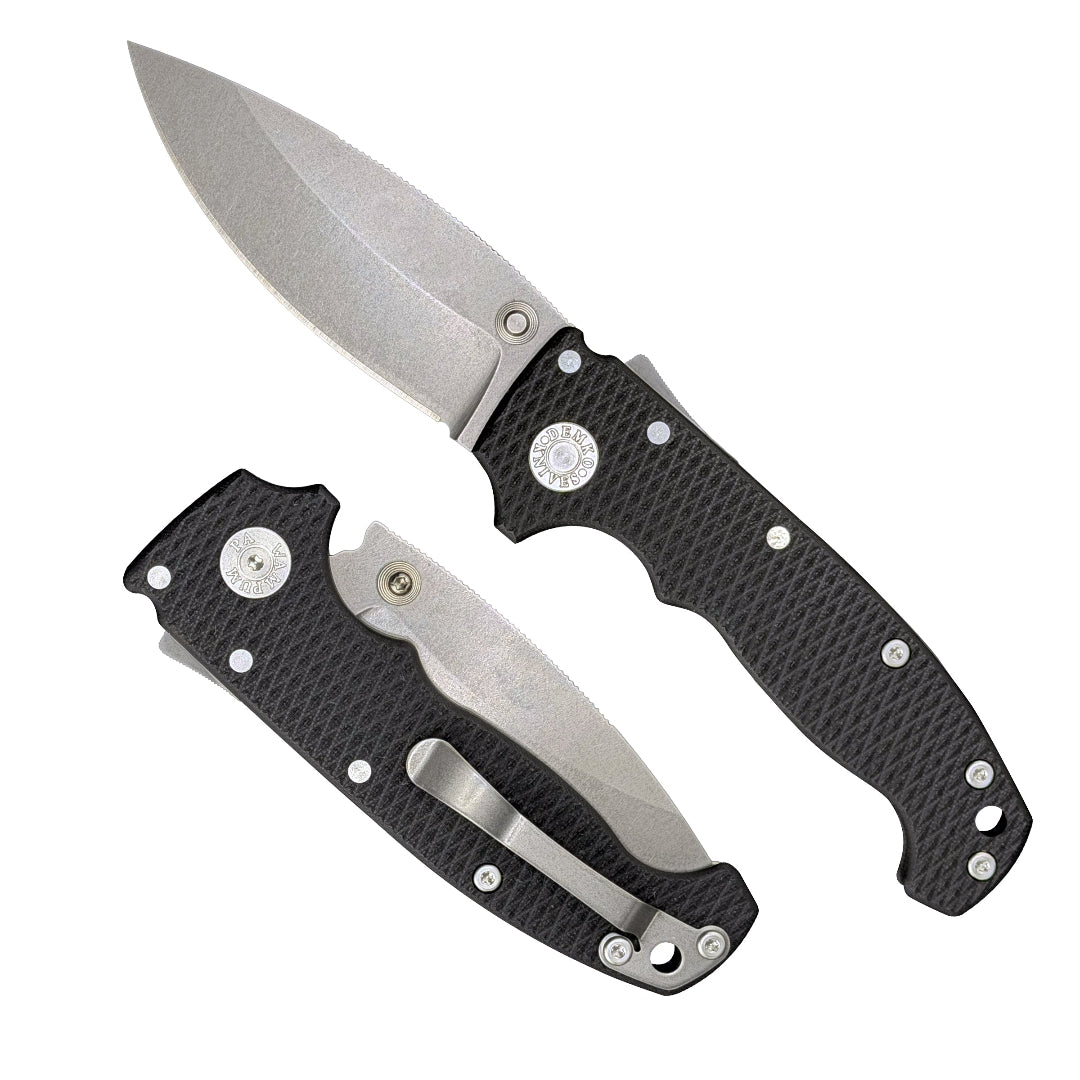 American made AD20S folding knife with MagnaCut barong blade and black G10 handle.