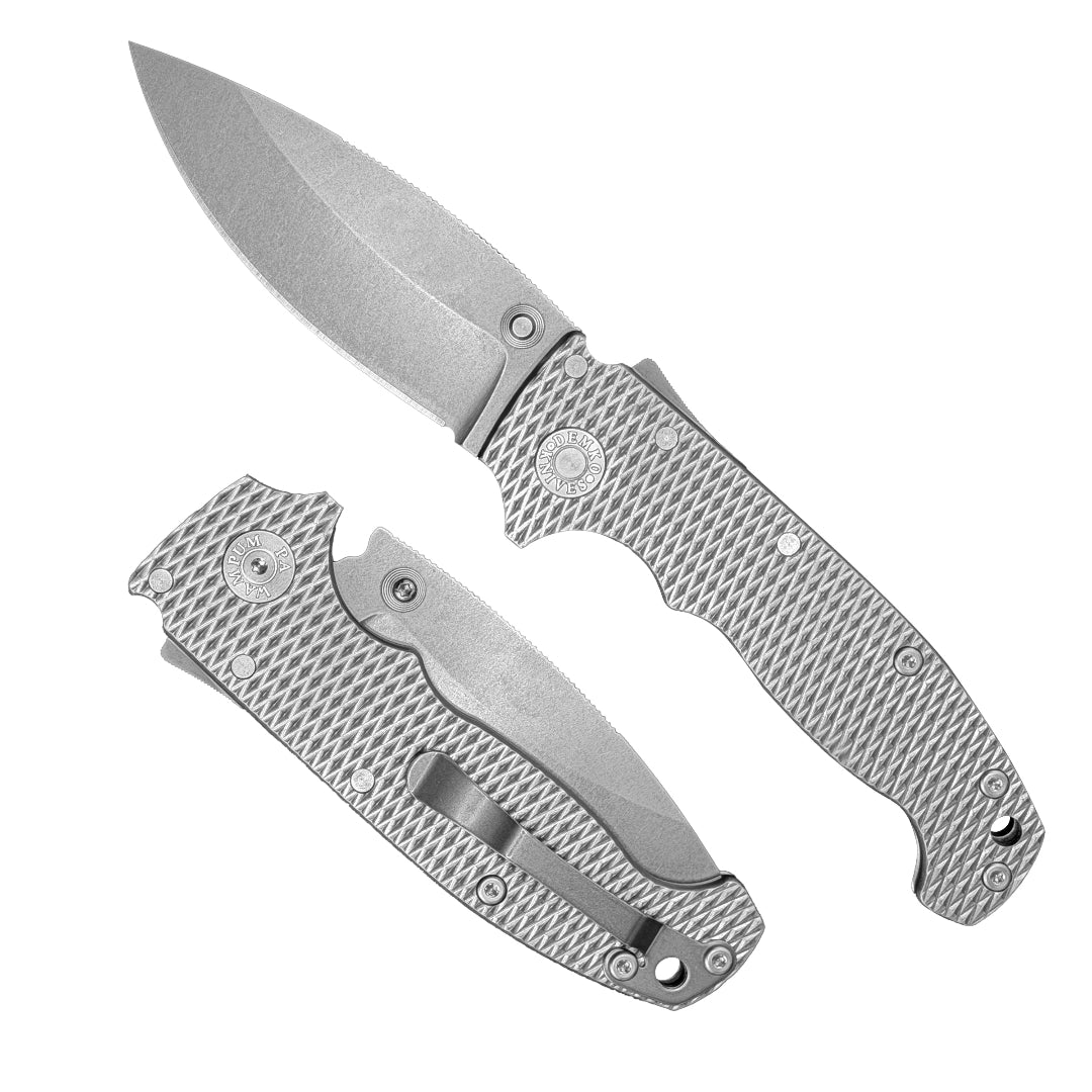 American made AD20S folding knife with MagnaCut barong blade and Milled Titanium handle.