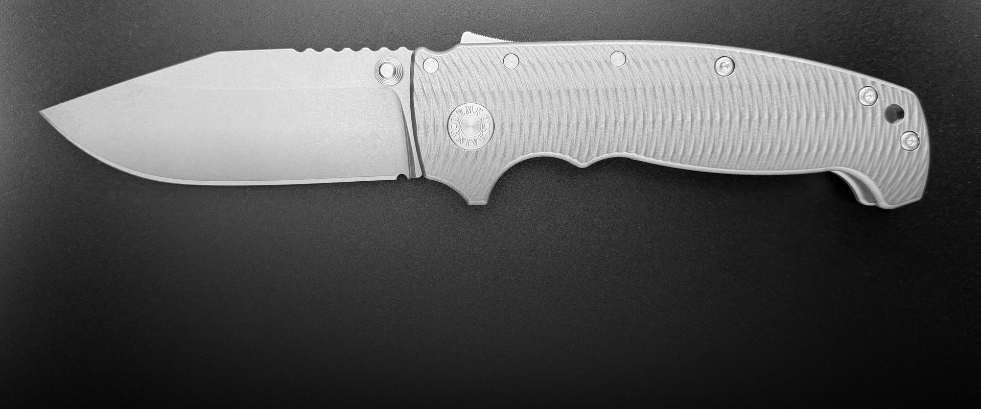 Website banner featuring the USA-Made AD20 XXX folding knife.