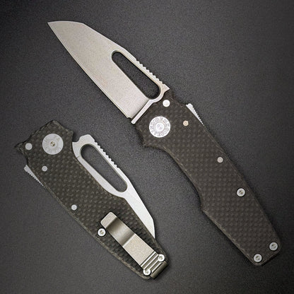 American made AD22 MagnaCut folding knife with carbon fiber handle on a dark gray background.