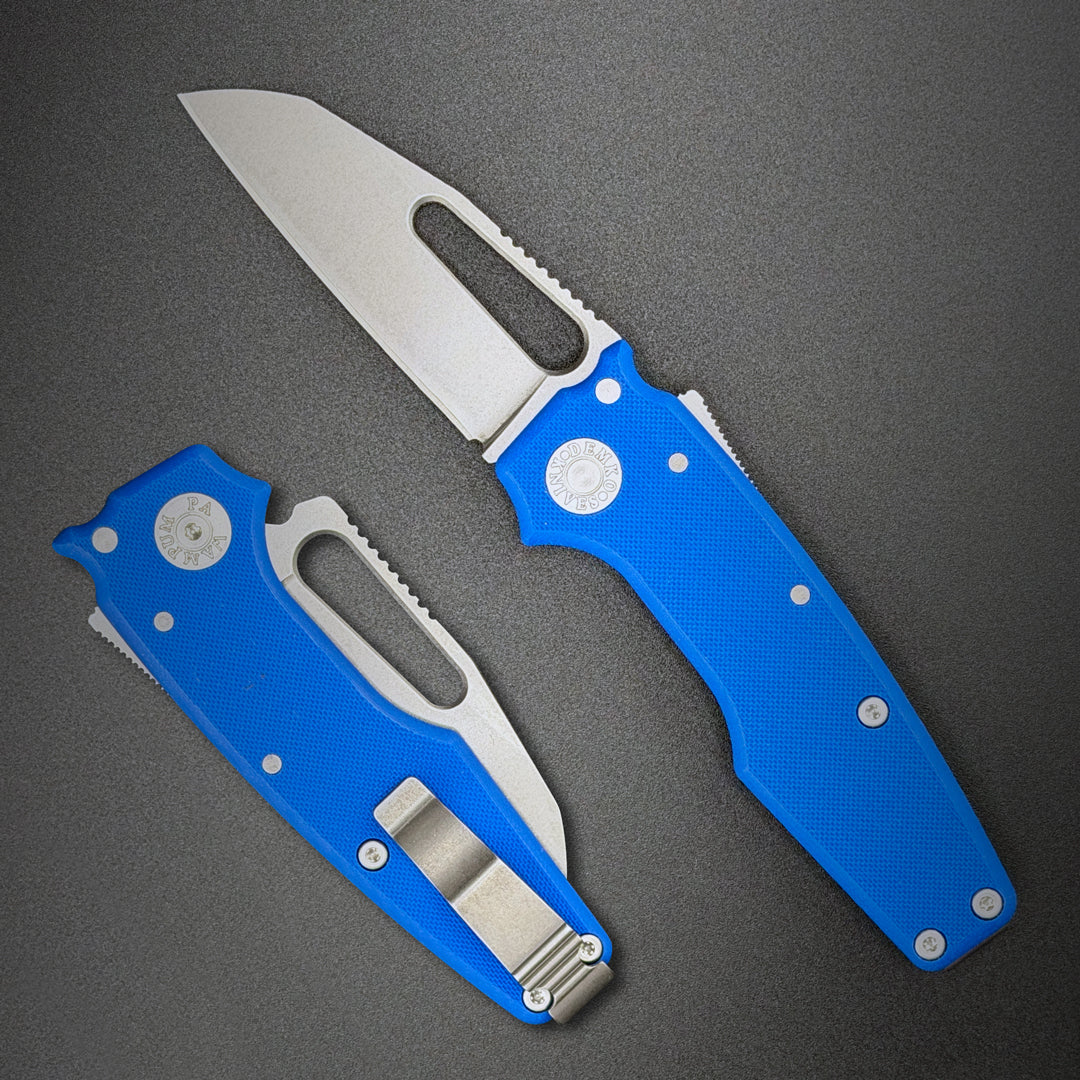American made AD22 folding knife with a MagnaCut shark foot blade, blue G10 handle, new deep carry pocket clip and shark-lock mechanism.