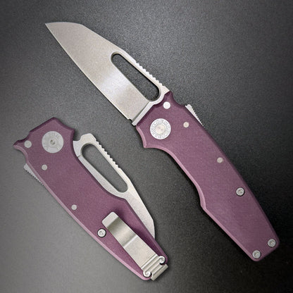 American made AD22 folding knife with a MagnaCut shark foot blade, purple G10 handle, new deep carry pocket clip and shark-lock mechanism.