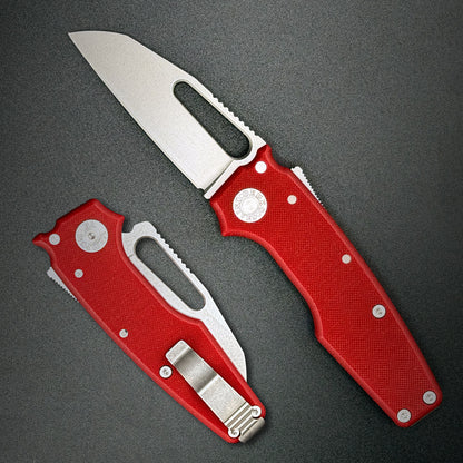 American made AD22 folding knife with a MagnaCut shark foot blade, red G10 handle, new deep carry pocket clip and shark-lock mechanism.