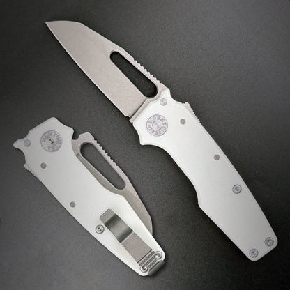 American made AD22 folding knife with a MagnaCut shark foot blade, white G10 handle, new deep carry pocket clip and shark-lock mechanism.