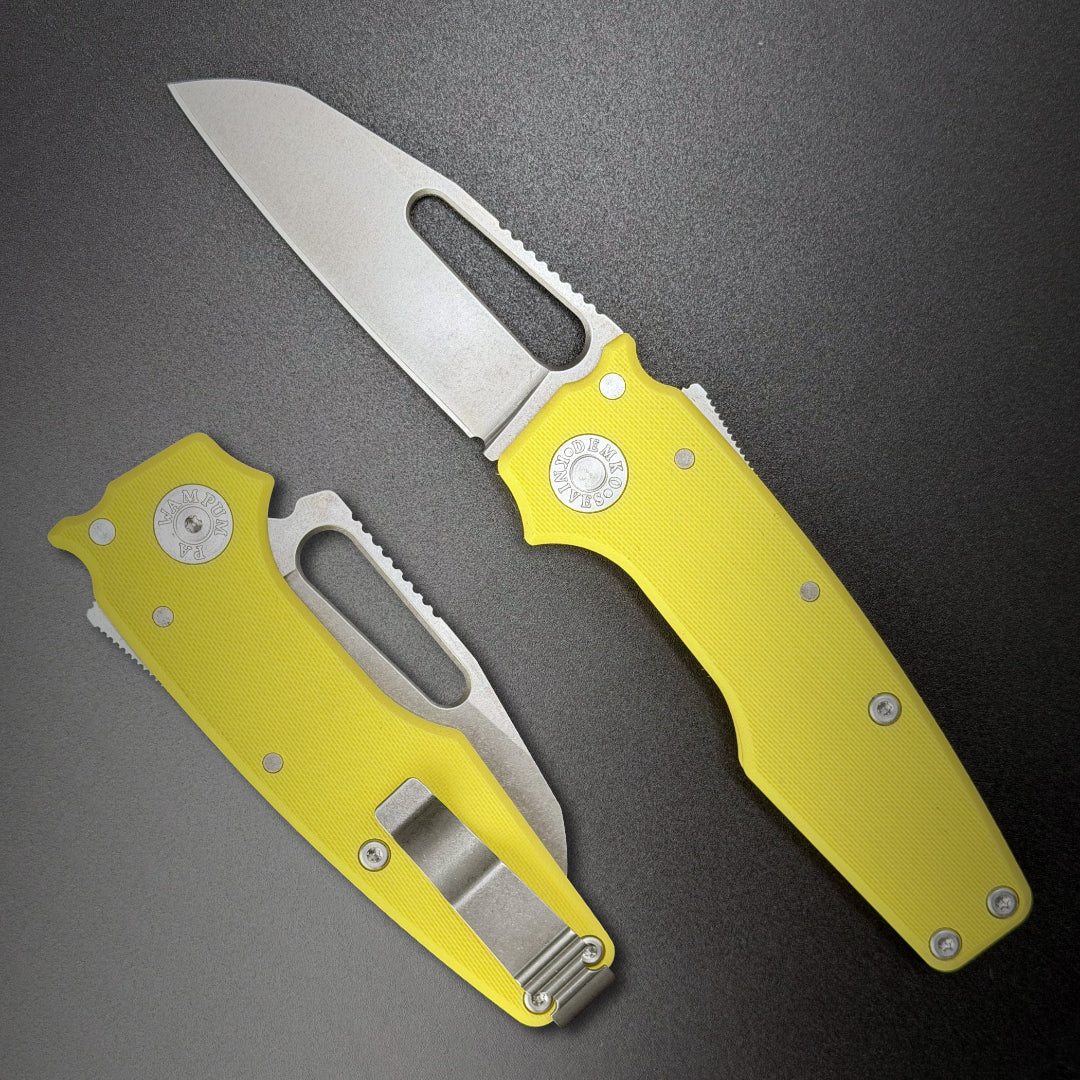 American made AD22 folding knife with a MagnaCut shark foot blade, yellow G10 handle, new deep carry pocket clip and shark-lock mechanism.