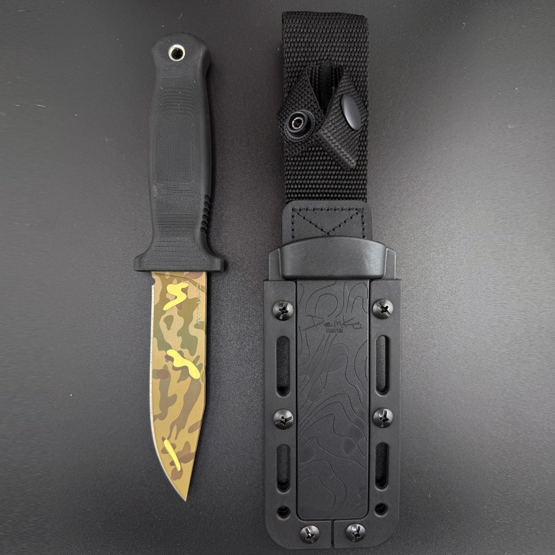 American made Armiger 4 black knife with cerakote 7-color camouflage blade and sheath.
