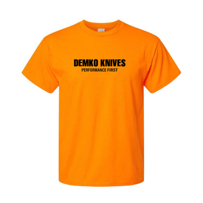 Orange t-shirt with 'Demko Knives Performance First' text on a white background.