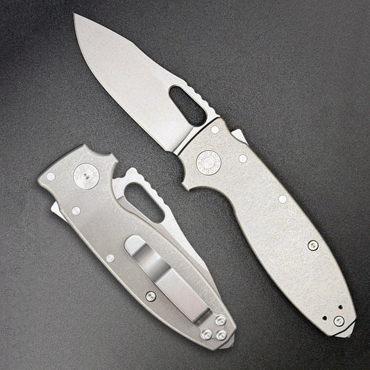 American made Shark-A-Tac folding knife with a MagnaCut blade, integral spike carbide glass breaker, titanium handles and a deep carry pocket clip.