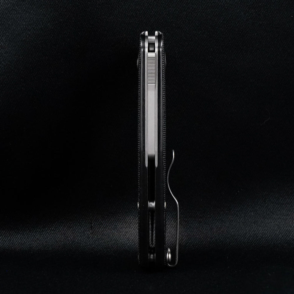 Shark-Cub GRN pocket knife standing on end, showcasing the shark-lock mechanism.