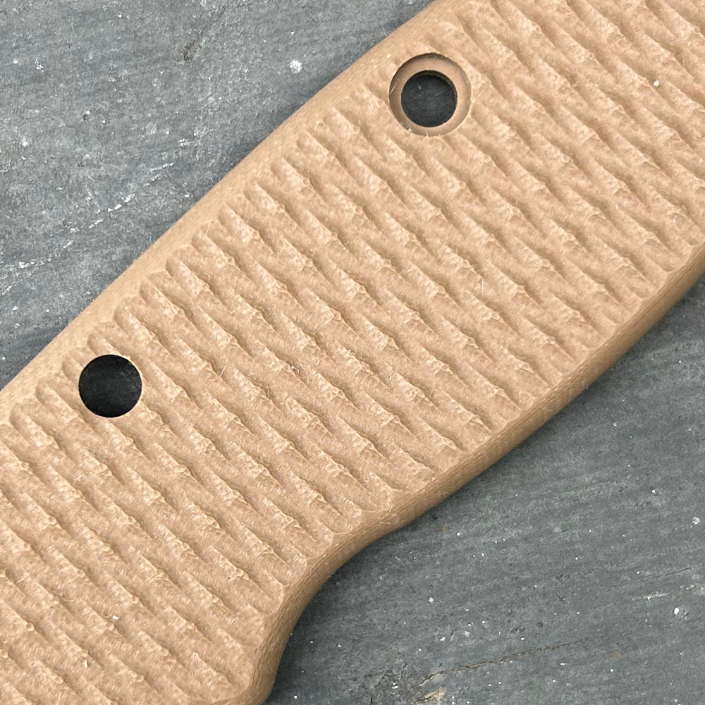 Close-up of earth milled texture G10 scales for our USA-Made AD20 folding knife.