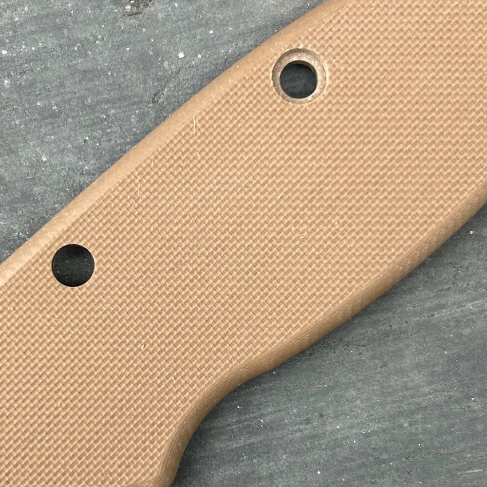 Close-up view of a earth peel ply G10 scales for USA-Made AD20.