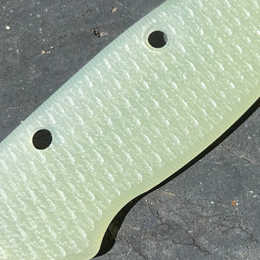 Close-up of natural milled texture G10 replacement scales for AD20 folding knife.