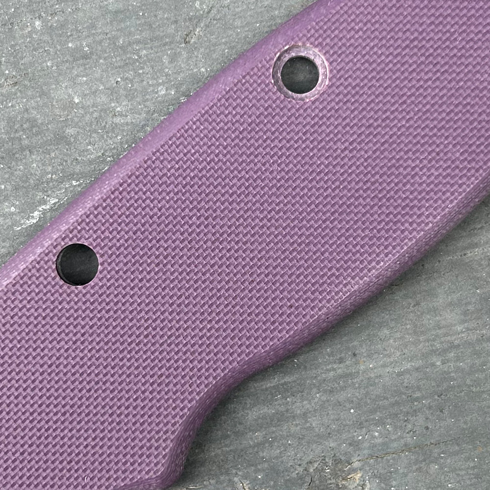 Close-up of purple peel ply texture G10 replacement scales for AD20 folding knife.