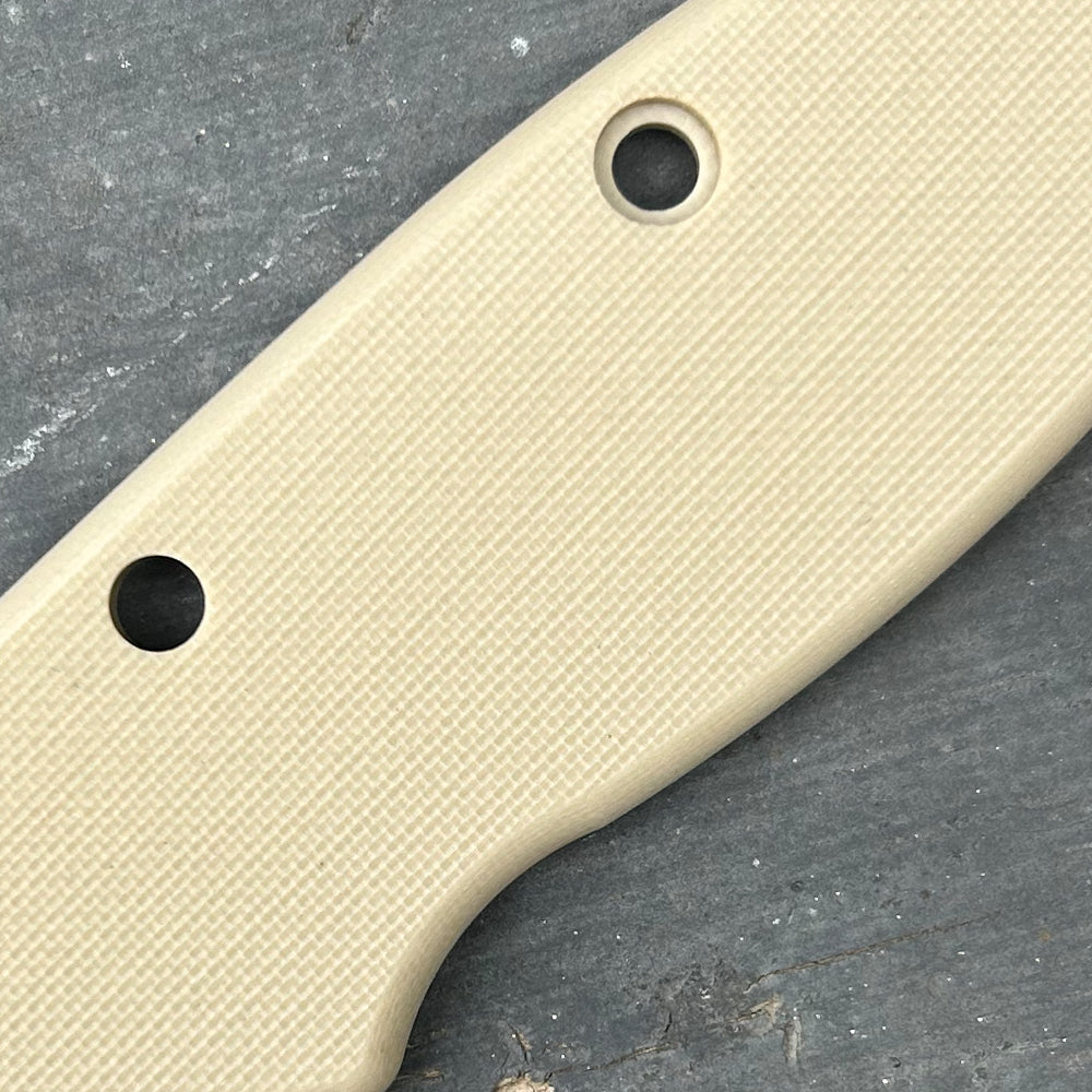 Close-up view of a tan peel ply G10 scales for USA-Made AD20.