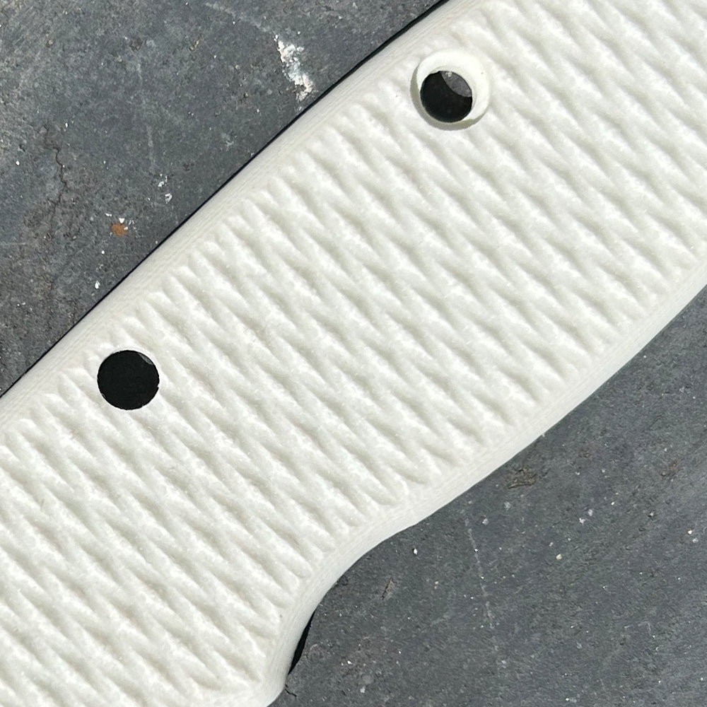 Milled white G10 handle scale for our USA-Made AD20 folding knives.